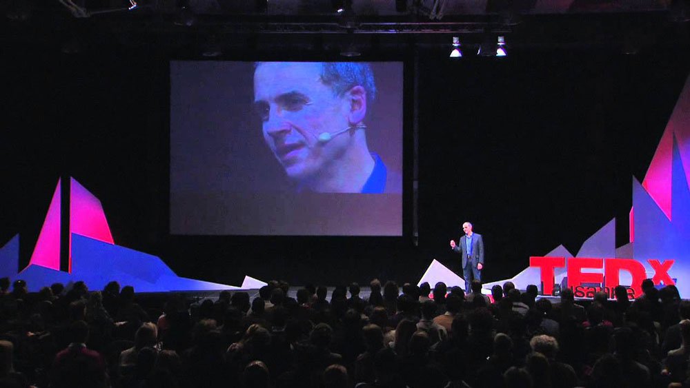 John Zimmer speaking at TEDx Lausanne