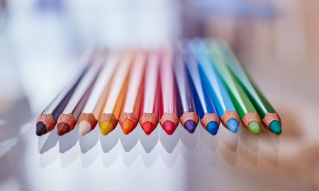 Coloured pencils in a row