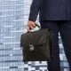 Business man with briefcase pitching to investors