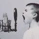 young person shouting into microphone