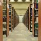 rows of bookcases in public library