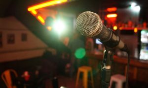 microphone set up in bar for comedy act