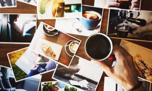 Photos spread out on desk