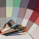 muted colour swatches with paint brushes