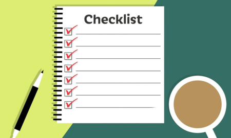 illustration of checklist on paper beside cup of tea