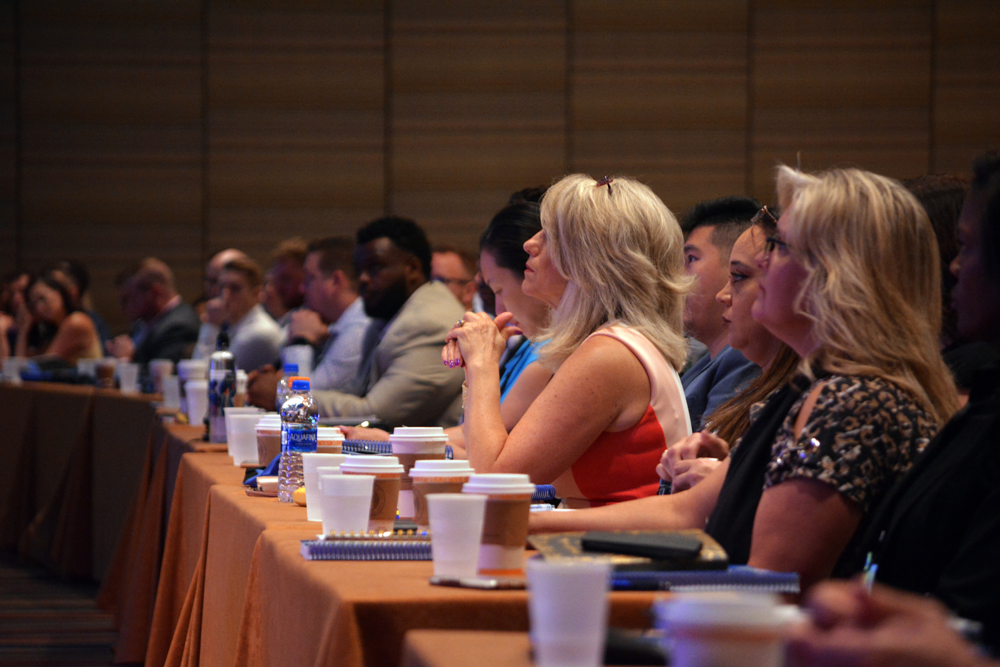 captivated audience watching speaker